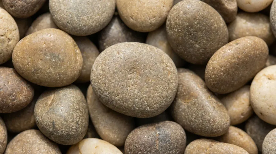 Close-up of pea gravel texture showing smooth rounded stones