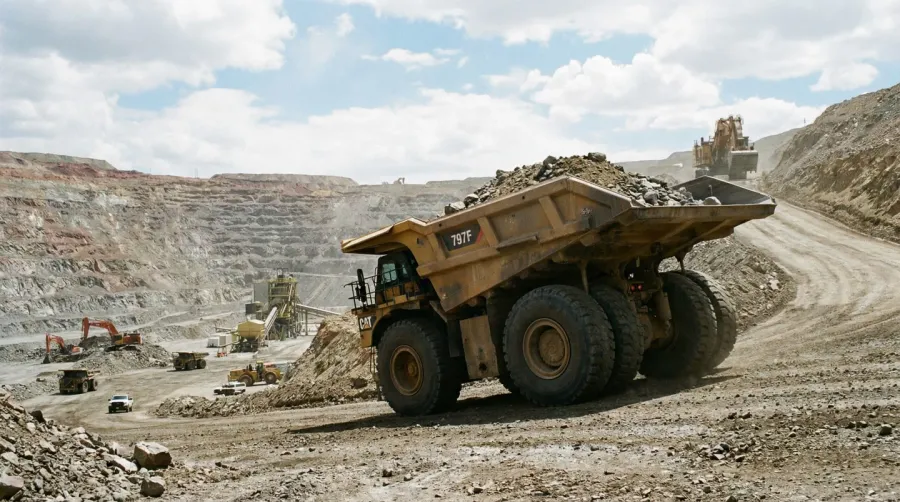 Off-highway mining dump truck operating in a quarry