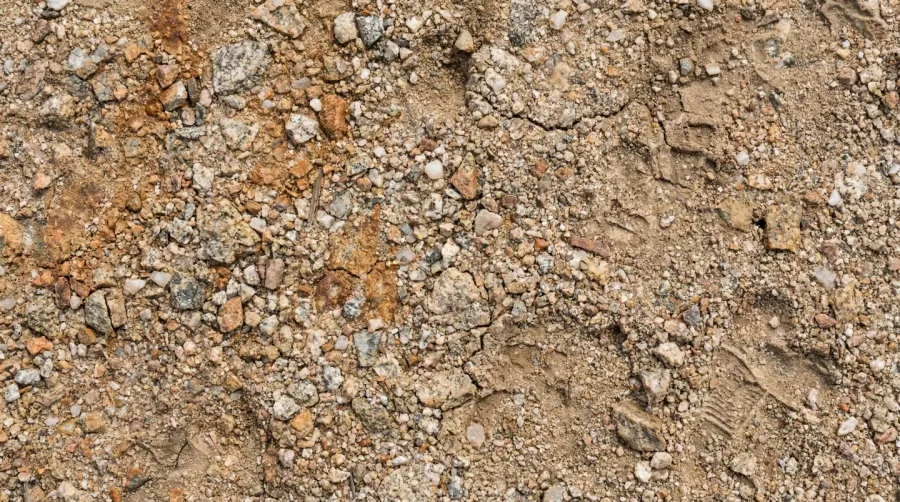 Close-up texture of compacted decomposed granite surface