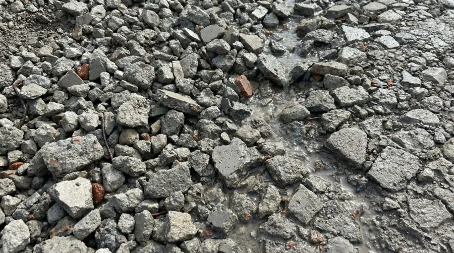 Crushed concrete material close-up texture showing drainage properties