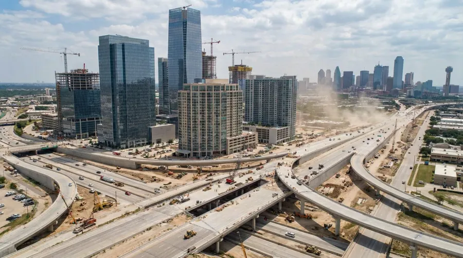 Dallas Fort Worth construction site with highway expansion and modern buildings