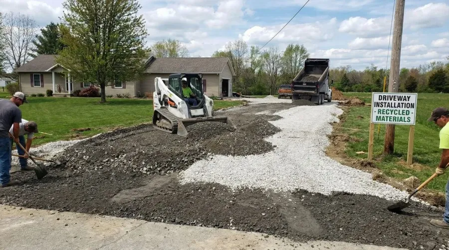 Driveway installation showing crushed concrete and limestone applications