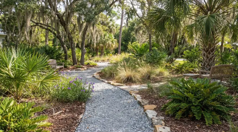 Beautiful garden pathway made with crushed concrete in a Sarasota landscape design