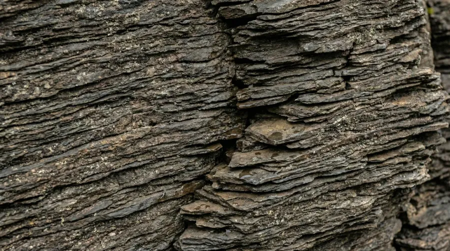 Close-up view of shale rock layers showing natural drainage properties