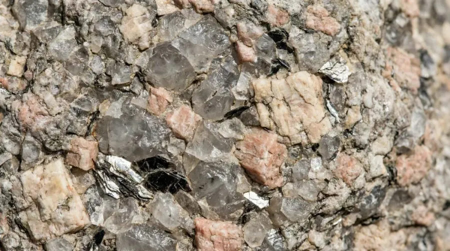 Close-up texture of granite stone showing mineral formations