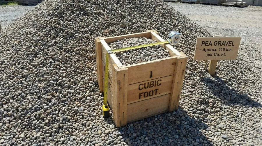 Pea gravel pile measuring cubic feet