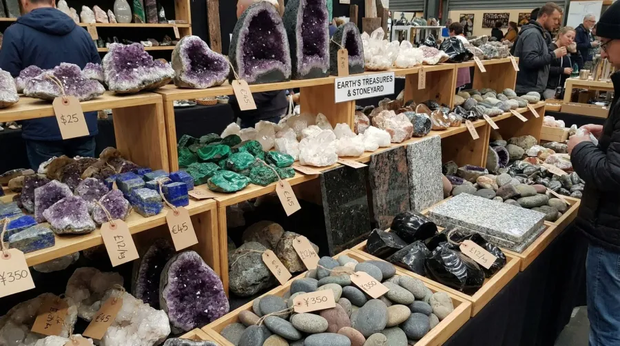 various types of rock materials displayed with price tags