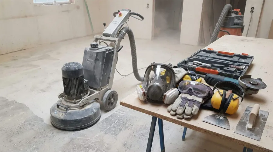 Concrete grinding equipment and safety gear including respiratory protection