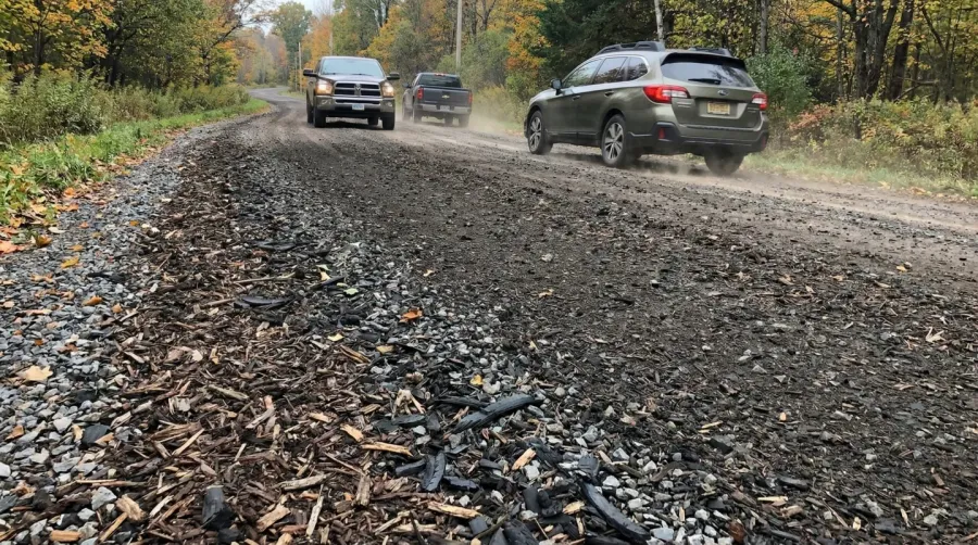 Road mulch surface with vehicles driving safely