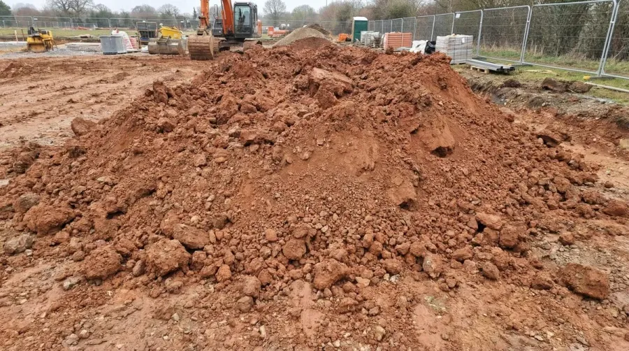Clay fill dirt pile at construction site