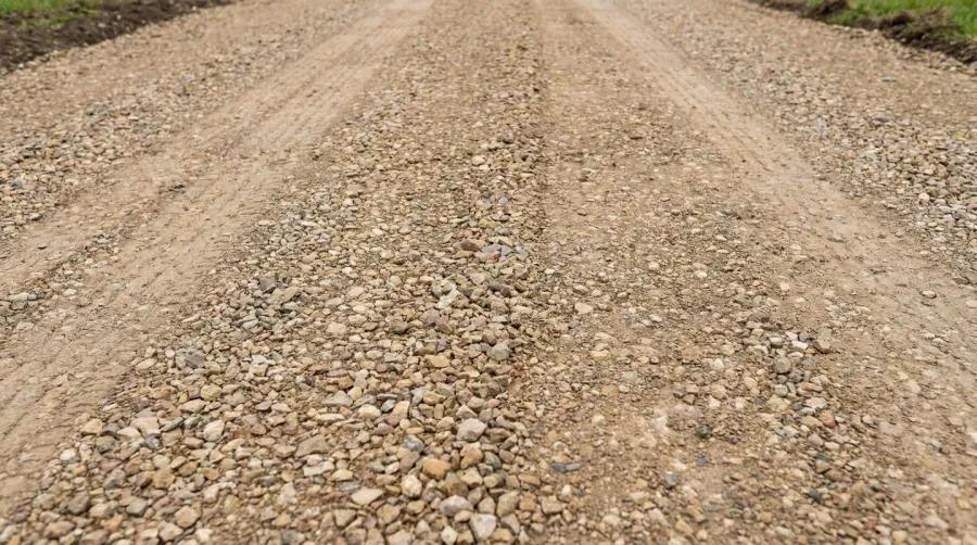Road bond gravel installed surface showing stable compacted texture