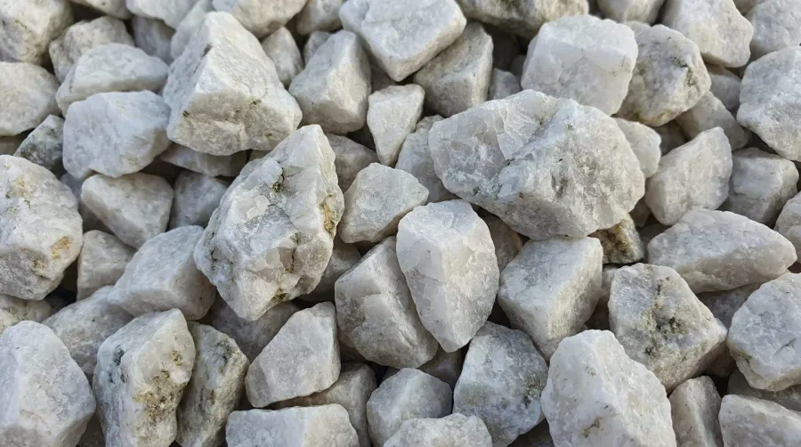Close-up shot of white dolomite gravel texture