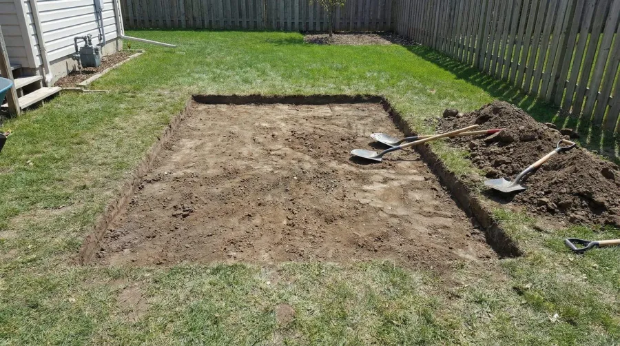 Step-by-step installation showing excavated area, landscape fabric, and gravel being spread and leveled