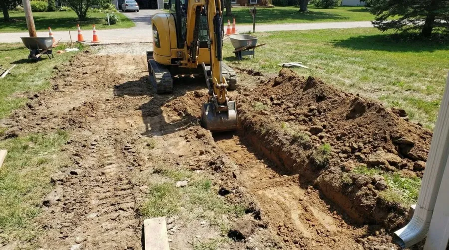Step By Step Driveway Base Installation Showing Excavation And Compaction