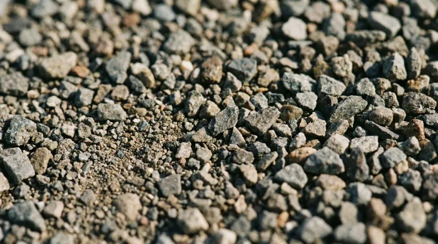 Close-up of quarter minus gravel texture showing angular particles