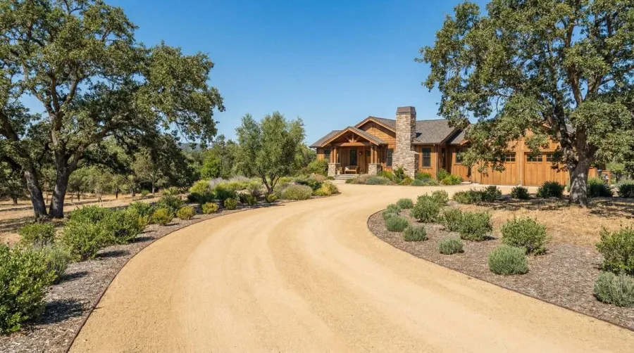 Well-maintained decomposed granite driveway in excellent condition