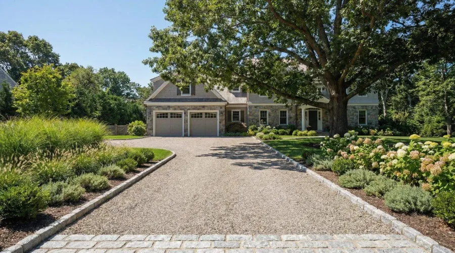 Well-maintained fine gravel driveway with proper edging