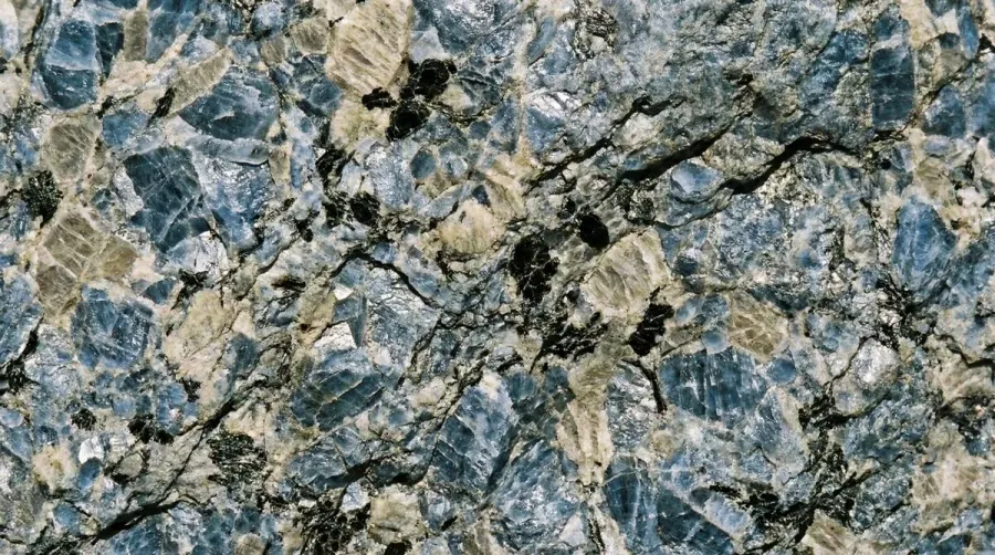 Close Up View Of Blue Granite Texture Showing Mineral Composition And Natural Patterns