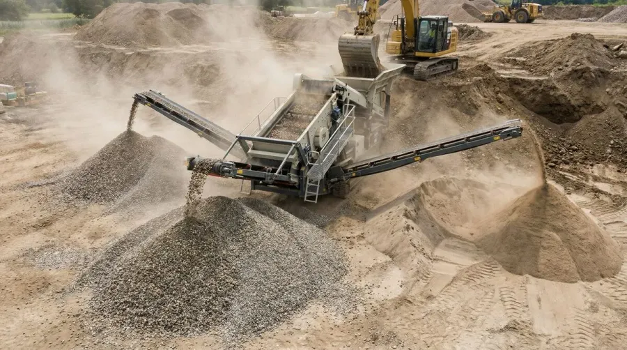 Sand and gravel separation process showing sieve and materials